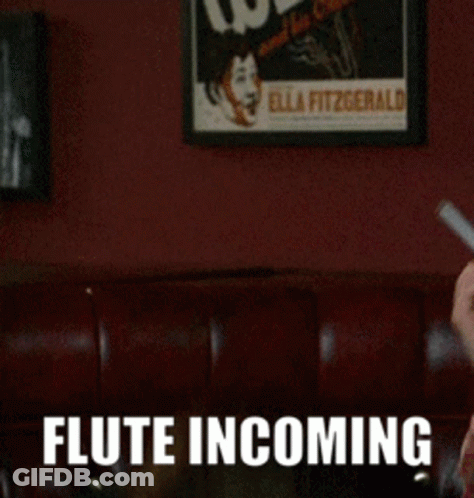 Man Playing Flute With Flute Incoming GIF