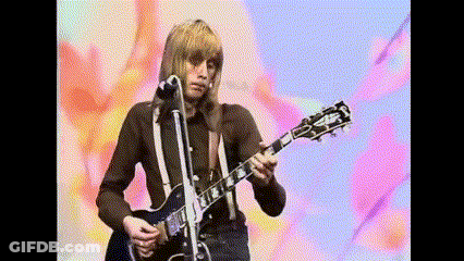 Man Playing Gibson Guitar In Front Of Microphone GIF