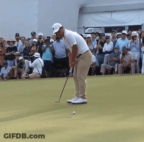 Man Playing Golf In Front Of Crowd GIF