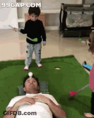 Man Playing Golf With Boy Standing Beside GIF