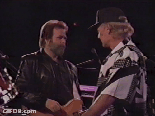 Man Playing Guitar And Another Playing Drums GIF