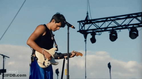 Man Playing Guitar And Singing At Coachella GIF