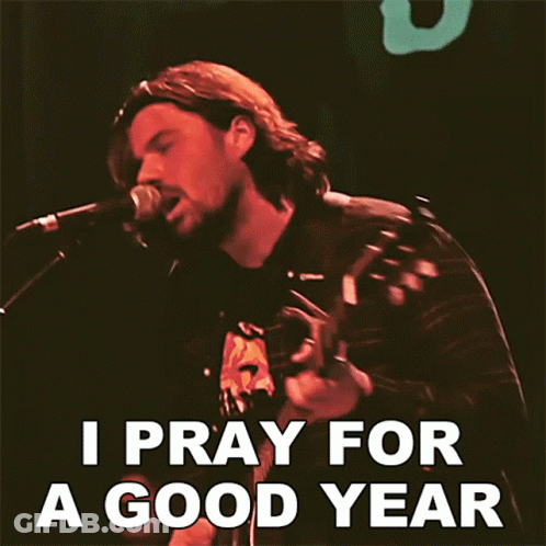Man Playing Guitar And Singing I Pray For A Good Year GIF