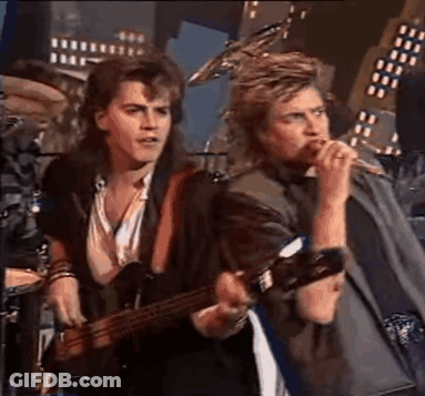 Man Playing Guitar And Singing Into Microphone With Drummer GIF
