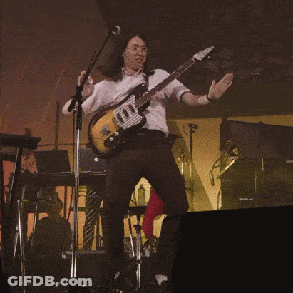 Man Playing Guitar And Singing On Stage GIF