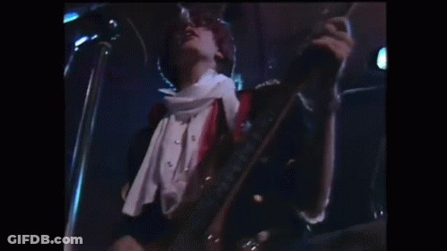 Man Playing Guitar And Singing On Stage GIF