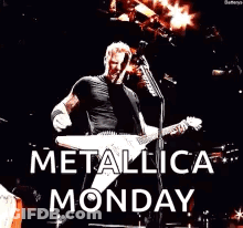 Man Playing Guitar And Singing On Stage GIF