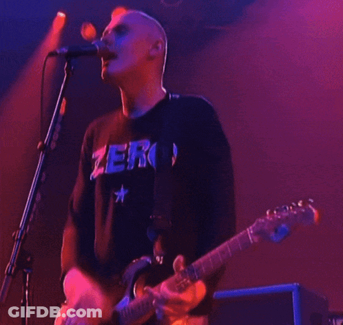 Man Playing Guitar And Singing With Zero Shirt GIF