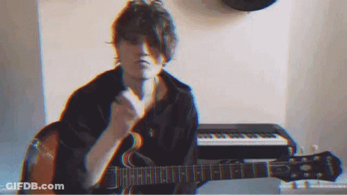Man Playing Guitar And Singing GIF