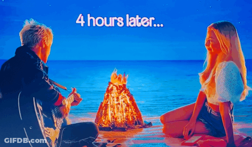 Man Playing Guitar By Campfire 4 Hours Later GIF