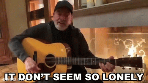 Man Playing Guitar By Fireplace It Don't Seem So Lonely GIF