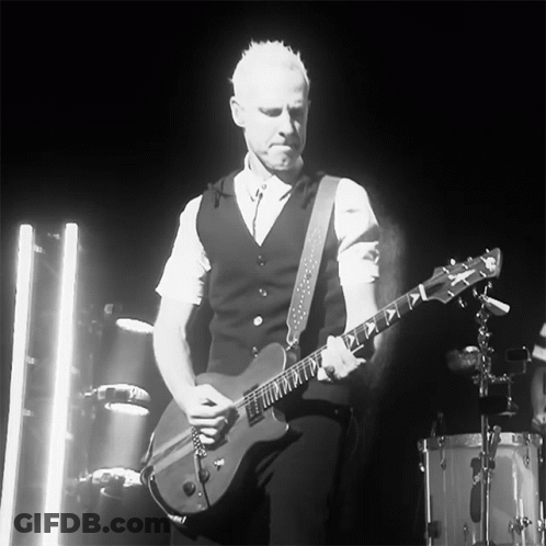Man Playing Guitar In Dark Room GIF