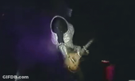 Man Playing Guitar In Dark Room GIF