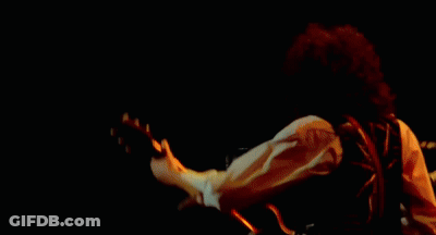 Man Playing Guitar In Front Of Crowd GIF