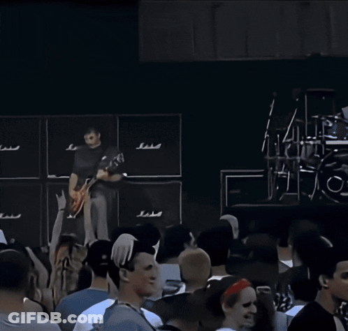 Man Playing Guitar In Front Of Marshall Amps GIF