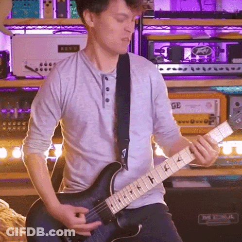 Man Playing Guitar In Front Of Mesa Amp GIF