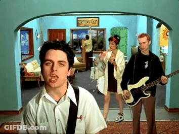 Man Playing Guitar In Living Room GIF