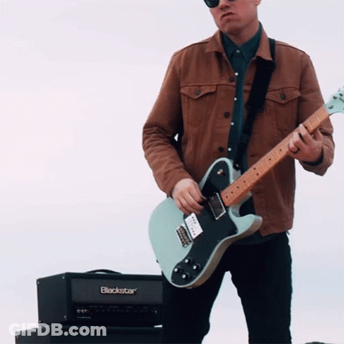 Man Playing Guitar Next To Blackstar Amp GIF
