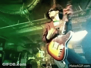 Man Playing Guitar On Stage GIF