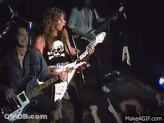 Man Playing Guitar On Stage Before Crowd GIF