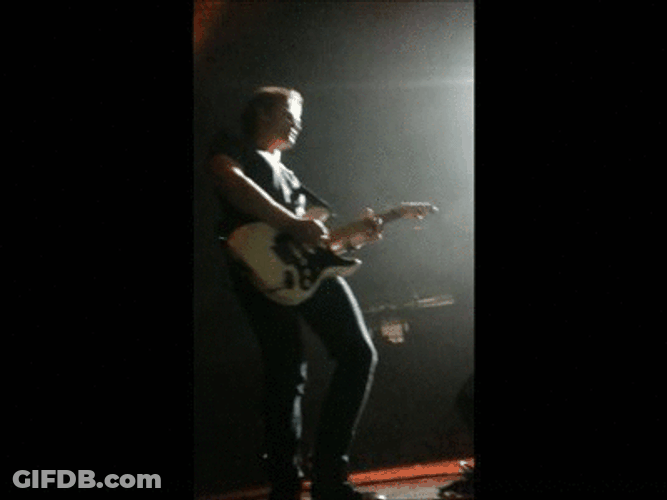 Man Playing Guitar On Stage GIF