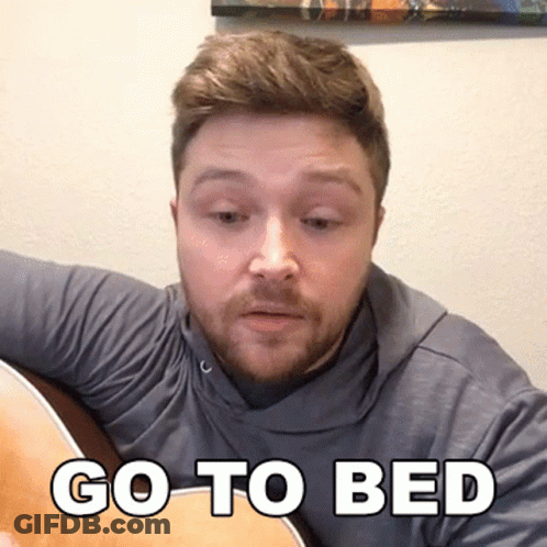 Man Playing Guitar Saying Go To Bed GIF