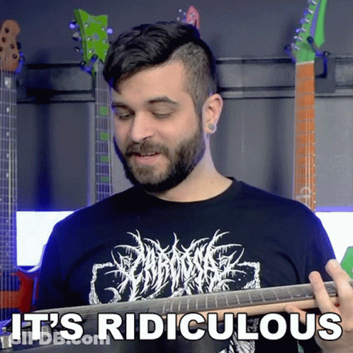 Man Playing Guitar Saying It's Ridiculous GIF