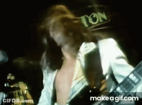 Man Playing Guitar Shirtless On Stage GIF