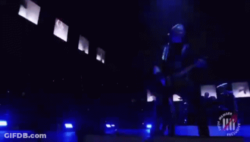 Man Playing Guitar Singing On Stage GIF