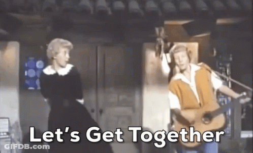 Man Playing Guitar While Woman Dancing GIF