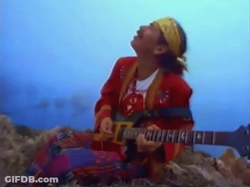 Man Playing Guitar With Bandana GIF