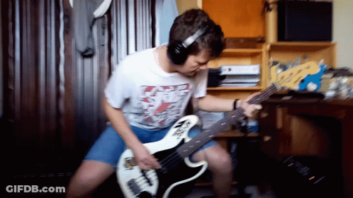 Man Playing Guitar With Headphones GIF