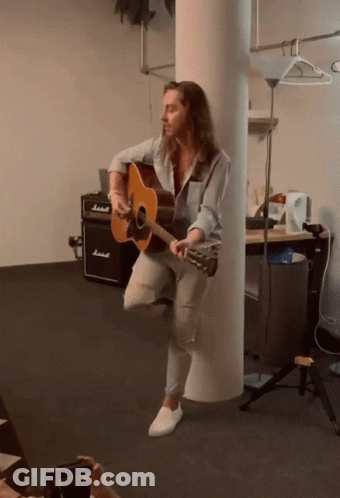 Man Playing Guitar With Marshall Amplifier GIF