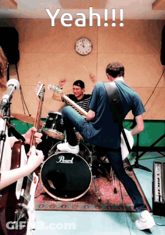 Man Playing Guitar With Pearl Drum Set GIF