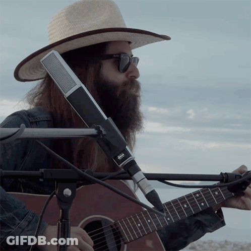 Man Playing Guitar With Sennheiser Microphone GIF