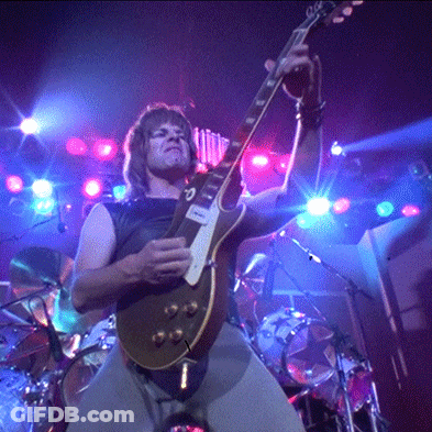 Man Playing Guitar With Sticker Saying A GIF