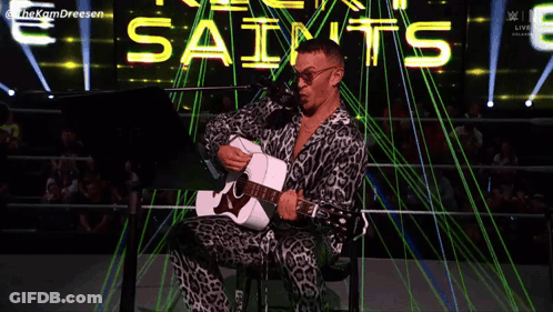 Man Playing Guitar With We Believe In Ricky GIF