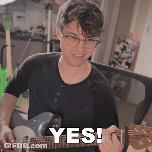 Man Playing Guitar With Yes Written On Face GIF