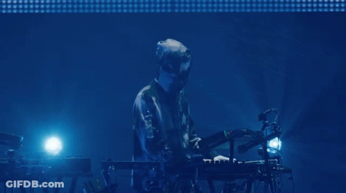 Man Playing Keyboard With Letter X On Jacket GIF
