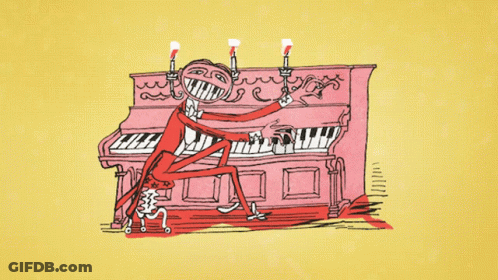 Man Playing Piano With Candles GIF