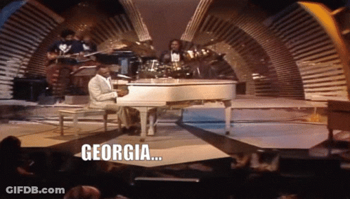 Man Playing Piano With Georgia GIF