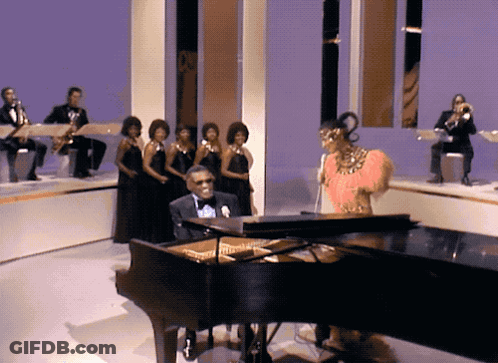 Man Playing Piano Woman Singing GIF
