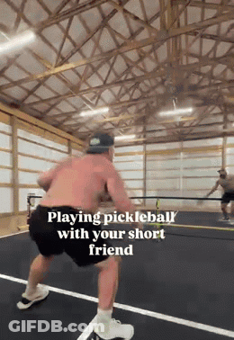 Man Playing Pickleball With Short Friend GIF
