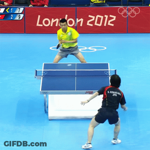 Man Playing Ping Pong In Front Of London 2012 Sign GIF