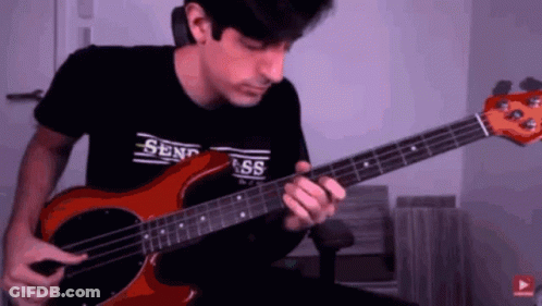 Man Playing Red Bass Guitar With Send Ass Shirt GIF