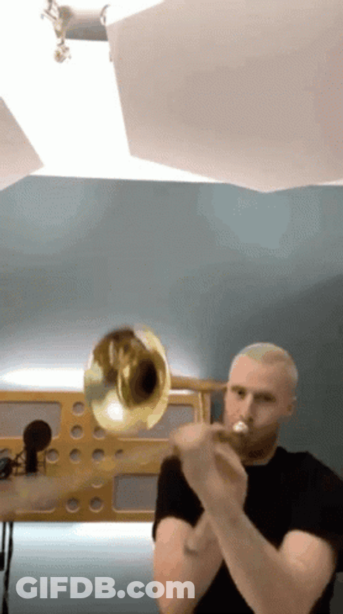 Man Playing Sad Trombone GIF