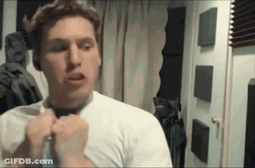 Man Playing Saxophone In Dark Room GIF