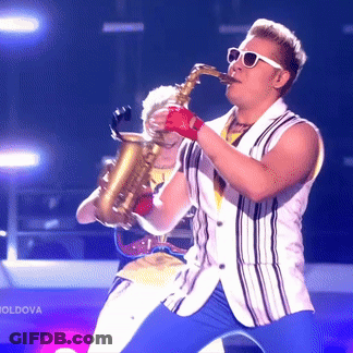 Man Playing Saxophone In Front Of Moldova Sign GIF
