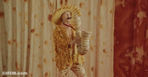 Man Playing Saxophone Made Of Tortilla Chips GIF