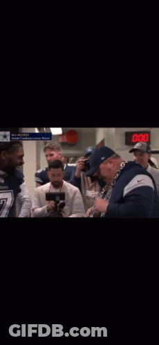 Man Playing Saxophone Near Airport Locker Sign GIF